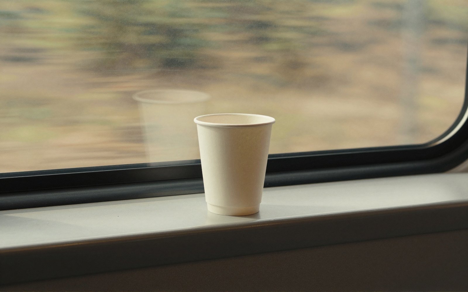 A paper cup and four hundred miles.